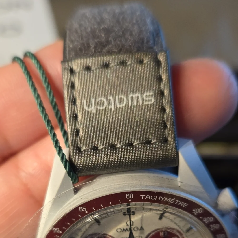 Omega Speedmaster with Red and Gray Accents - Picture 8 of 16